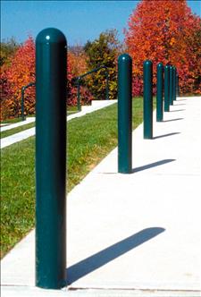 A row of seven 2190 Domed-top Metal Bollards